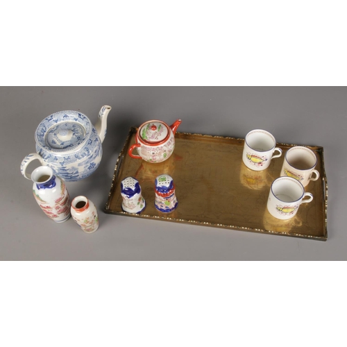 178 - A quantity of oriental ceramics including blue and white teapot, salt and pepper shakers. Also inclu... 