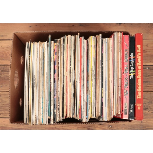 219 - A box of 50's and 60's vinyl records, to include The Beatles, Neil Sedaka, Little Richard, Four Tops... 