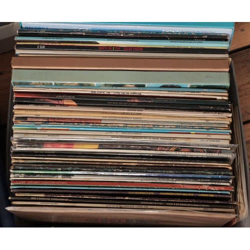 251 - Three boxes of LP records. Including Queen, Meatloaf, UB40, The Eagles, etc.