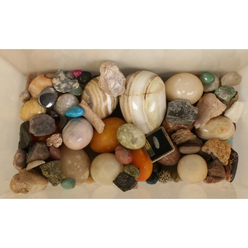 252 - A box of semi precious stones and hardstone eggs.