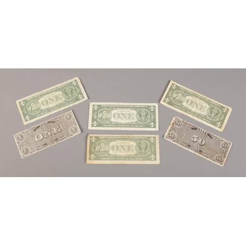 54 - USA Banknotes; To include 'The Confederate Fifty Dollars', dated February 17th 1864, and four Federa... 