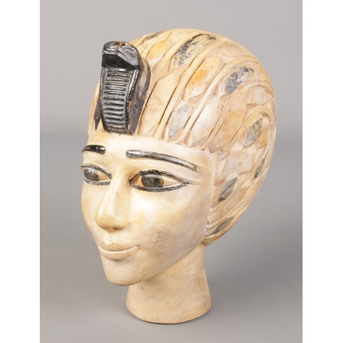 74 - A small plaster bust of King Tutankhamun. 19cm.