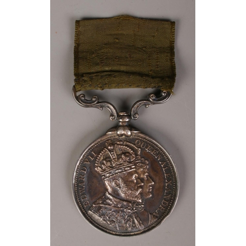 337 - An Edward VII commemorative medal. Awarded to the employees of Vickers Sons & Maxim Limited for 30 y... 