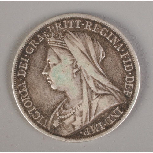 354 - A late Victorian silver crown, 1900, LXIII edge. 28.11g.