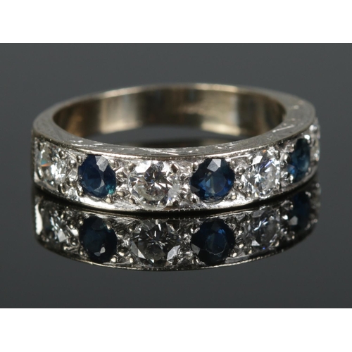 358 - An 18ct Gold Sapphire and Diamond half eternity ring. Each diamond ¼ct. Size Q. Total weight: 5.20g