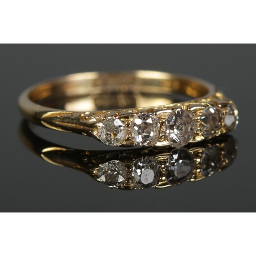 361 - An 18ct Gold carved half hoop five stone old European cut diamond ring. Approximately 0.65cts in tot... 