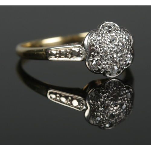 368 - An 18ct Gold and Platinum set diamond cluster ring. Assayed for Birmingham 1978. Size Q. Total weigh... 