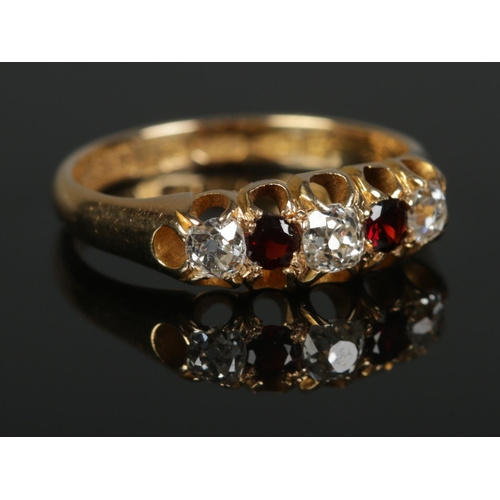 369 - A Victorian 18ct Gold five stone garnet and diamond ring. Assayed for Chester, 1881. Diamonds old cu... 