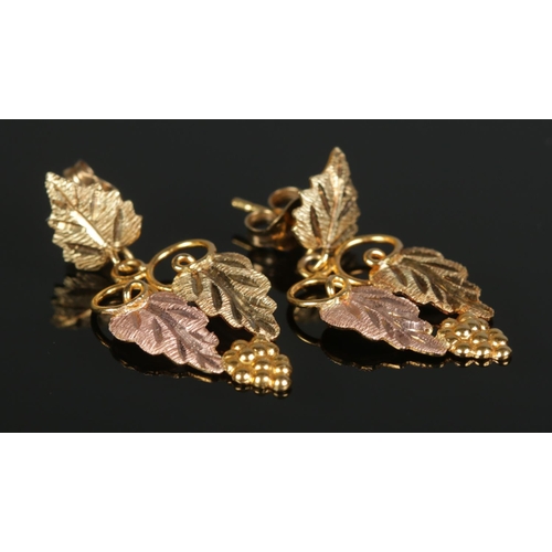 383 - A pair of 10ct Gold tri-coloured leaf earrings. Total weight: 2.20g.