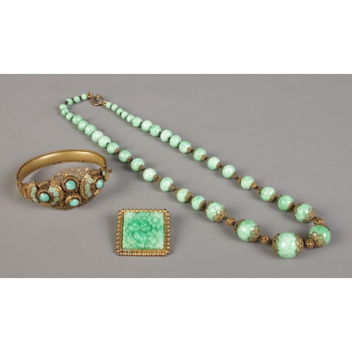 392 - A small quantity of mid Twentieth century Peking Glass jewellery, comprising of necklace, bangle and... 