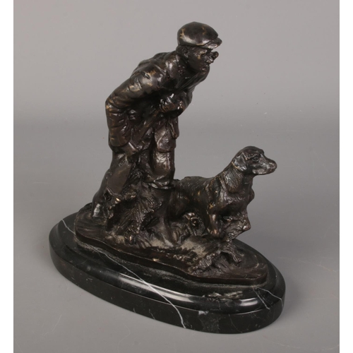 80 - After Mene, A bronze figure group of man and dog hunting. Raised of marble plinth. (18cm)