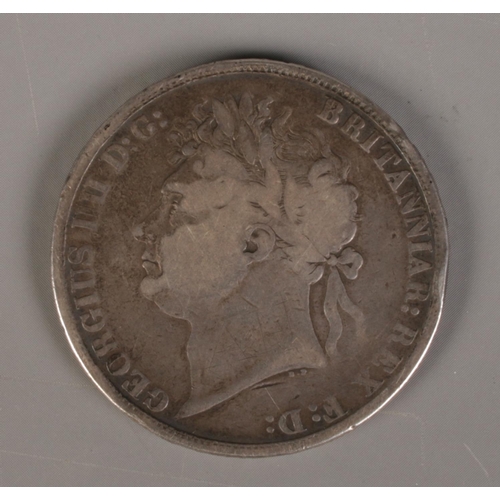 395 - A George IV silver crown, dated 1821.