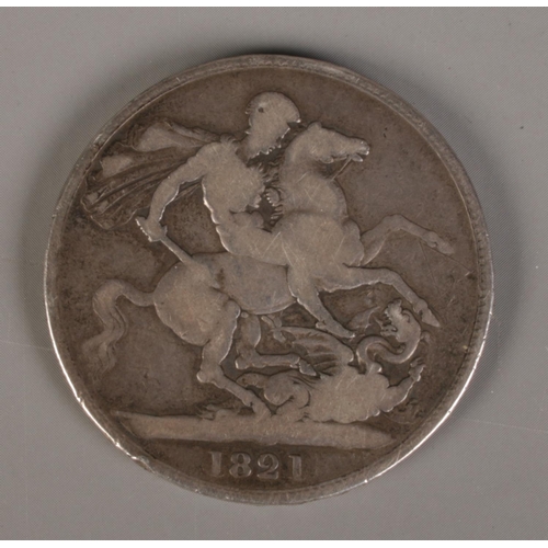 395 - A George IV silver crown, dated 1821.