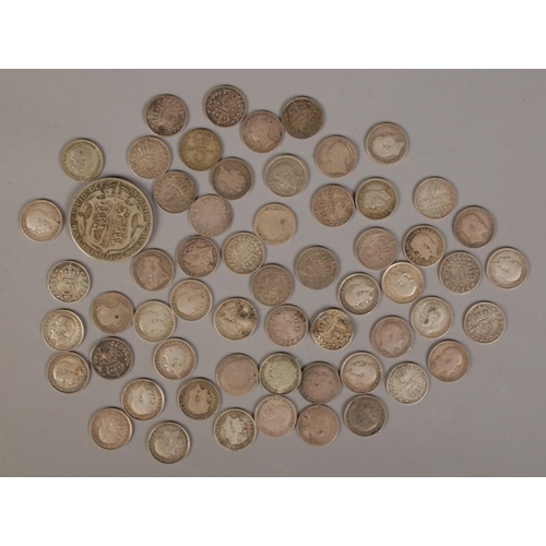 397 - A collection of 1920 and earlier British silver coins. Includes 1920 half crown and three pence piec... 