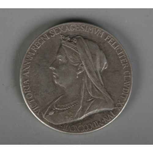 407 - A Victorian silver commemorative medal. Dated 1897. 9.78g.