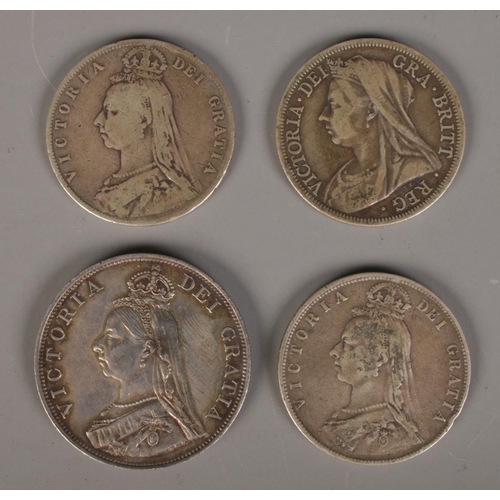 408 - Four Victorian silver coins. Including double florin and three half crowns. 63.92g.