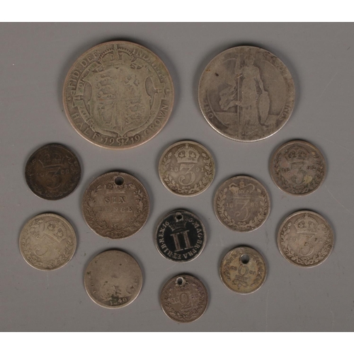 409 - A small quantity of silver coins. Including 1919 half crown, James II 1686 two pence, etc. 39.33g.