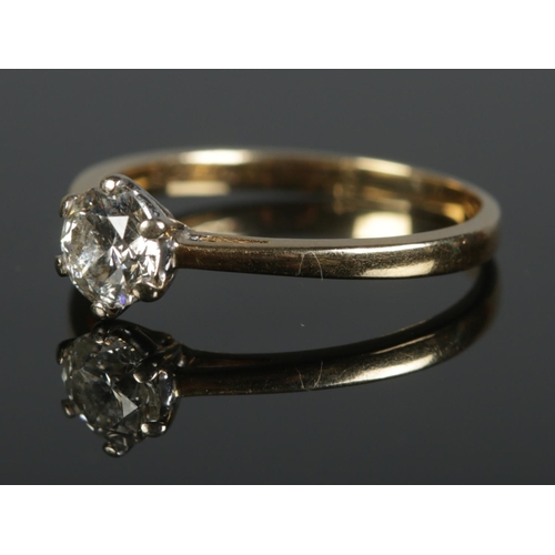 420 - An 18ct gold diamond solitaire ring. Approximately 0.75ct diamond. 2.6g. Size O.