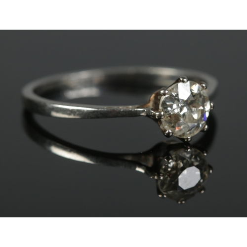 421 - A platinum diamond solitaire ring. Approximately 0.6ct diamond. 1.79g. Size L.