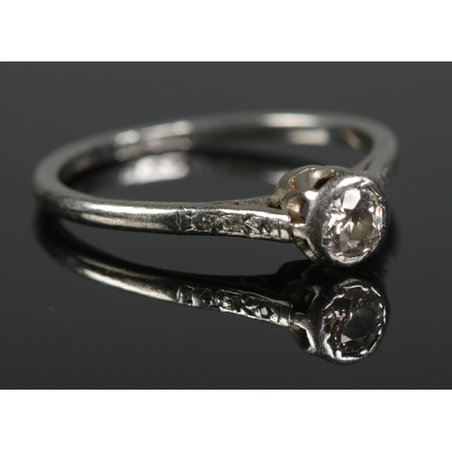 422 - A platinum diamond solitaire ring. Approximately 0.25ct diamond. 2.69g. Size M.