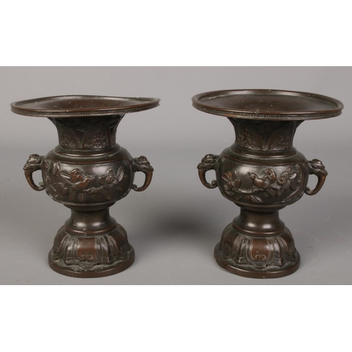 83 - A pair of Japanese Meiji period bronze vases. Decorated with bird and flowers. (12.5cm)