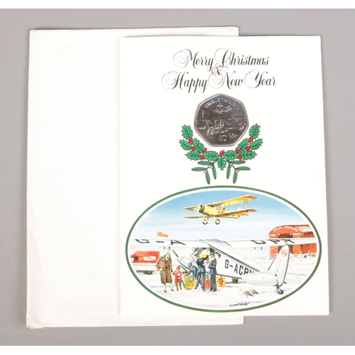 429 - A Pobjoy Mint Isle of Man Christmas 1985 50p piece, with envelope.