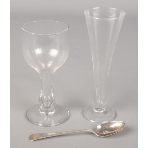 430 - A silver teaspoon along with two blown glass drinking vessels. Includes hollow stem example.