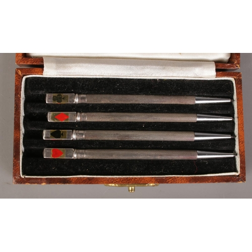 434 - A cased set of sterling silver Bridge pencils.