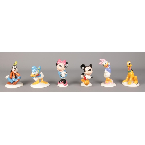 438 - A collection of six (five boxed) Royal Doulton figures from 'The Mickey Mouse Collection'. To includ... 