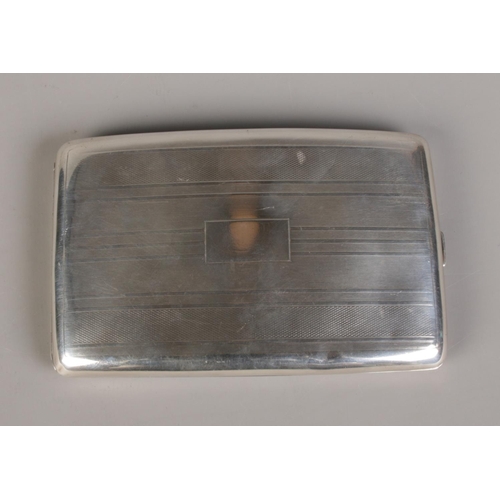 467 - A silver cigarette case. Hallmarked Birmingham 1929. Total weight 168g.