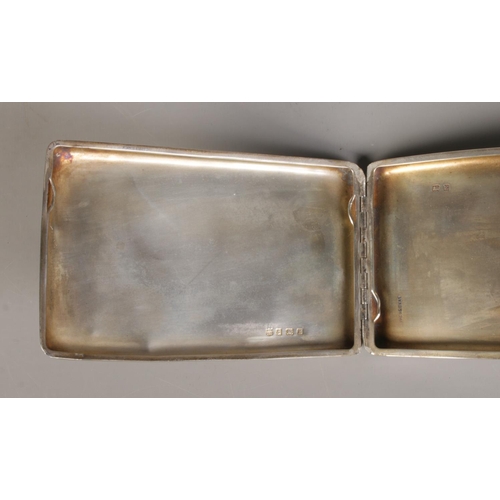 467 - A silver cigarette case. Hallmarked Birmingham 1929. Total weight 168g.