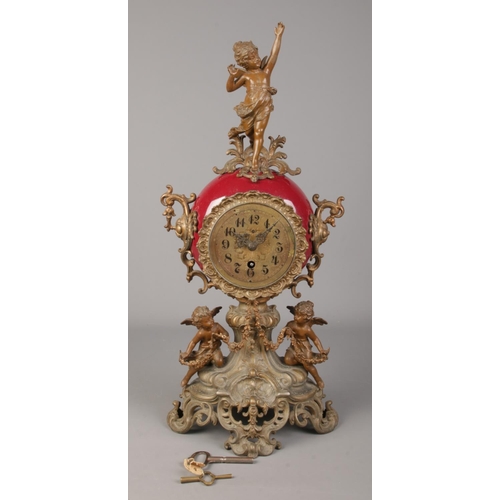 91 - An antique mantel clock surmounted with spelter cherubs. The movement stamped Lenzkirch 1 million. H... 