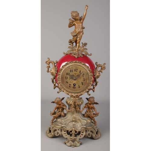 91 - An antique mantel clock surmounted with spelter cherubs. The movement stamped Lenzkirch 1 million. H... 