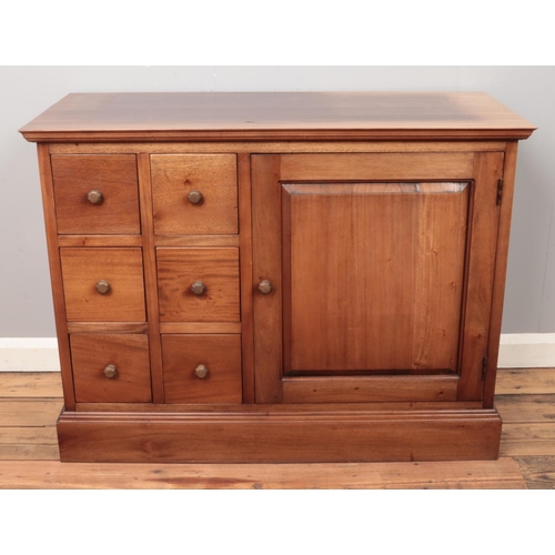 476 - A walnut side cabinet with six drawers and cupboard.