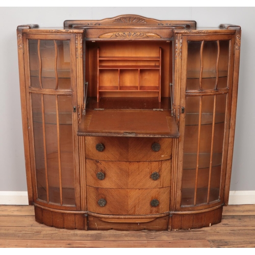 488 - An oak side by side bureau. (120cm x 125cm)