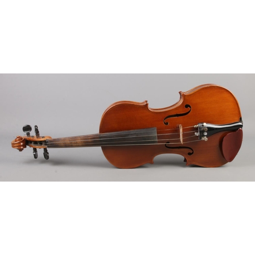 1 - A cased violin with one piece back. Label for Berini Violin. 14inch.