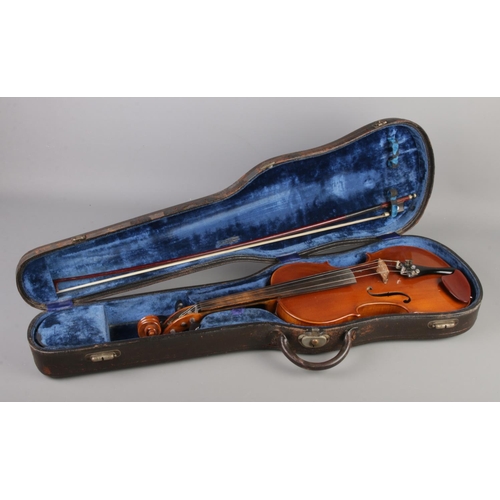 1 - A cased violin with one piece back. Label for Berini Violin. 14inch.