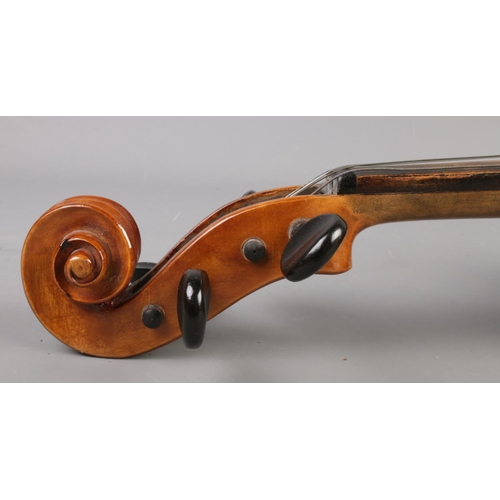 1 - A cased violin with one piece back. Label for Berini Violin. 14inch.