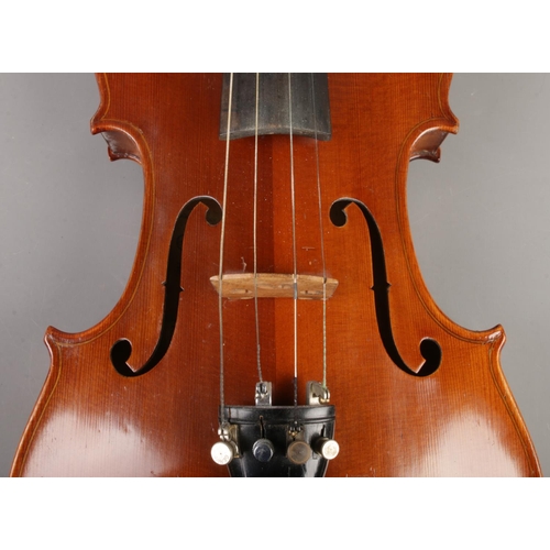 1 - A cased violin with one piece back. Label for Berini Violin. 14inch.