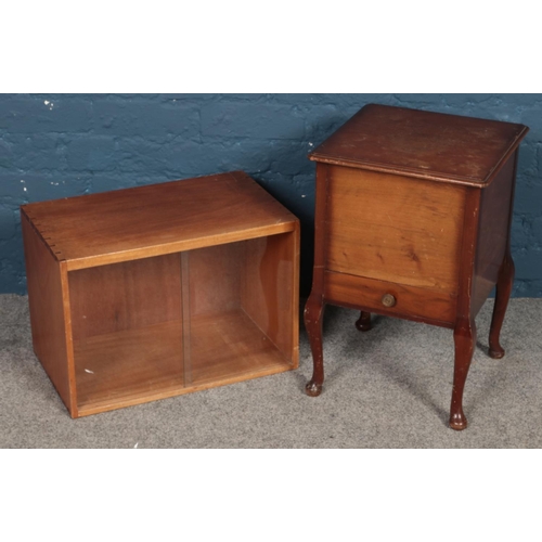 462 - A teak table top cabinet with glass sliding doors along with a mahogany sewing box.