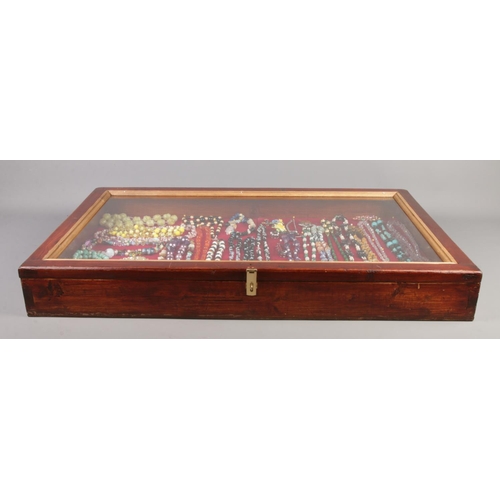 117 - A large table top bijouterie cabinet with a very good collection of assorted jewellery. To include n... 