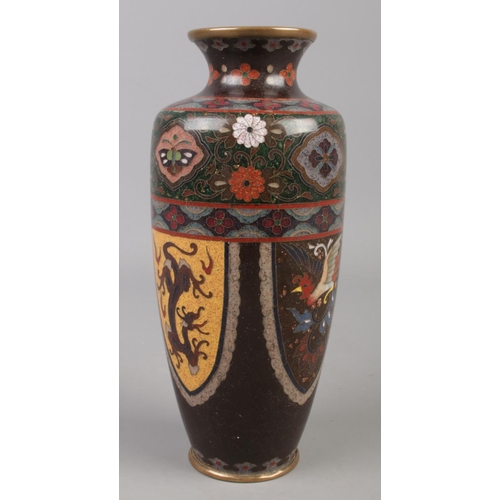 3 - A Japanese cloisonne vase with dragon and phoenix decoration. 18cm.