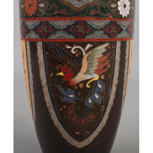 3 - A Japanese cloisonne vase with dragon and phoenix decoration. 18cm.