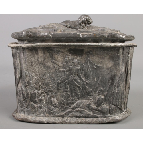 8 - A Victorian lead box and cover with decoration depicting scenes from the Crimean War. Stamped Stock ... 