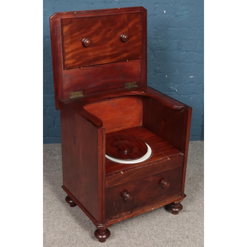 495 - A Victorian mahogany commode. Stamped for J&L Trueman.