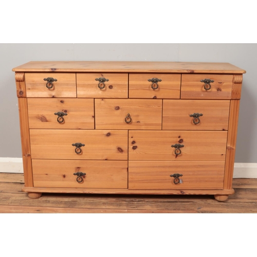 501 - A pine multi drawer sideboard.