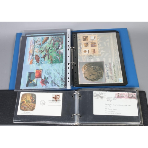 137 - Three albums of First Day covers including several international examples such as US, Germany, The N... 