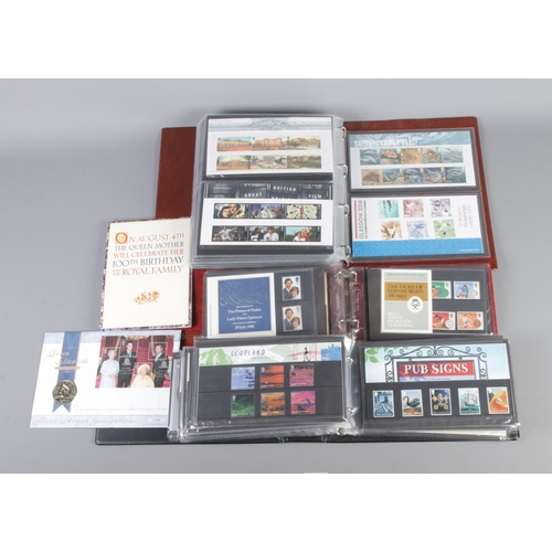 18 - Three albums of Royal Mail Presentation packs. Including The Duke of Edinburgh Award, Peter Pan, Doc... 