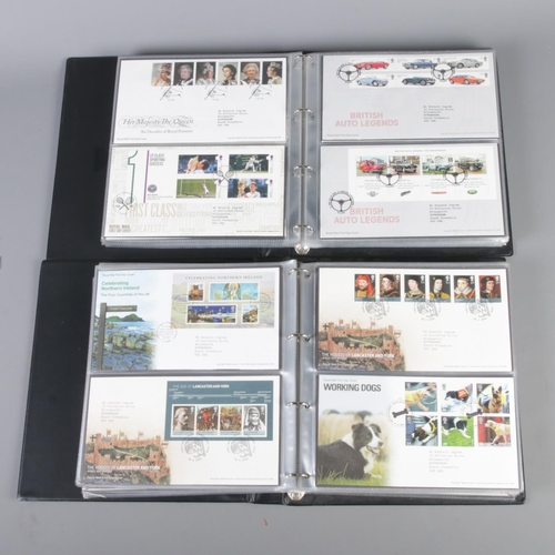 24 - Two albums of Royal Mail first day covers. Including RAF Uniforms, Harry Potter, London Underground,... 