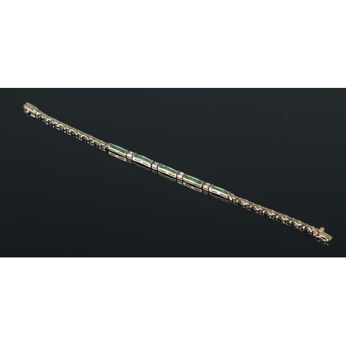 368 - A 9ct Gold, Diamond and Emerald bracelet. Stamped 375 to both ends of clasp. Total weight: 7.72g. Le... 